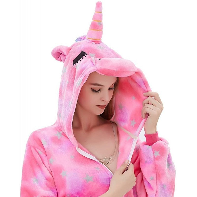 Close-up of pink unicorn hood with horn and ears on cozy fleece adult onesie.
